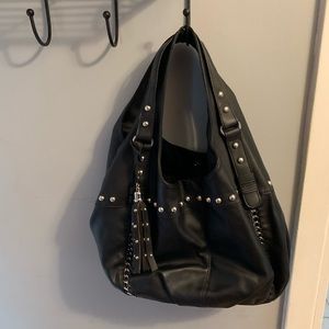 Black Purse with silver studs, three pockets.